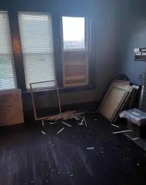 Broken window in Yeshitela’s house from Police/FBI raid. [Source: Photo courtesy of Burning Spear Media]