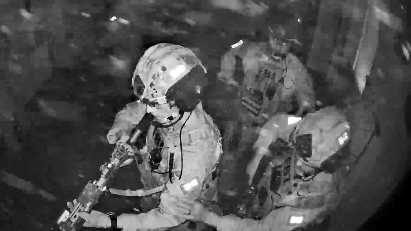 Combat clad FBI agents raiding Yehitela’s home. [Source: news.stlouispublicradio.org]